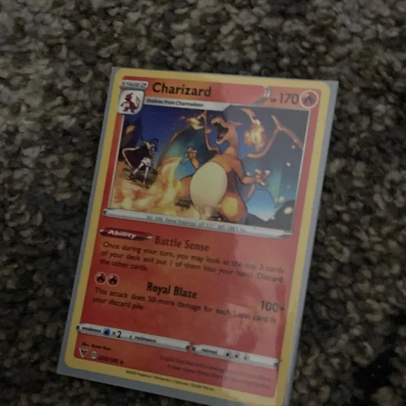 Pokemon Charizard Trading Card - Red and Yellow also has a sleeve - Picture 9 of 9